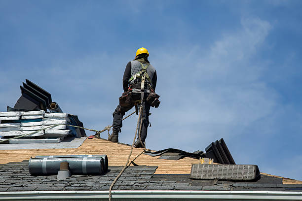 Professional Roof Replacement technician working in Hollister, CA